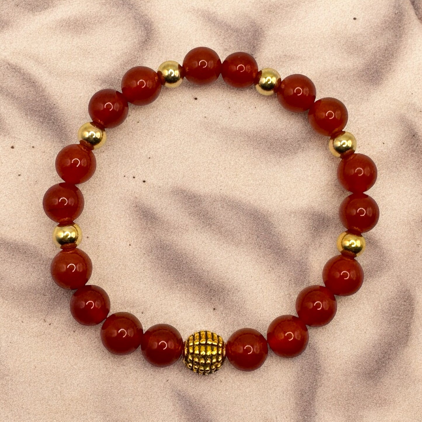 Carnelian (with gold-colored charms) Bracelet