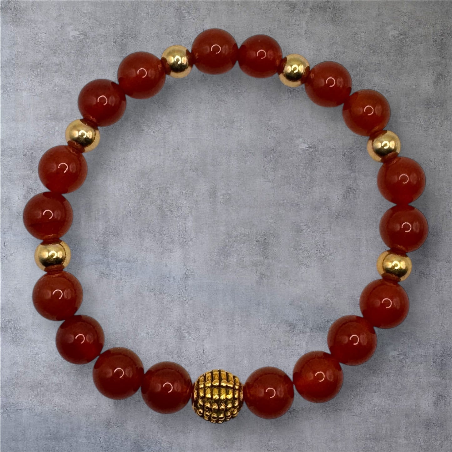 Carnelian (with gold-colored charms) Bracelet