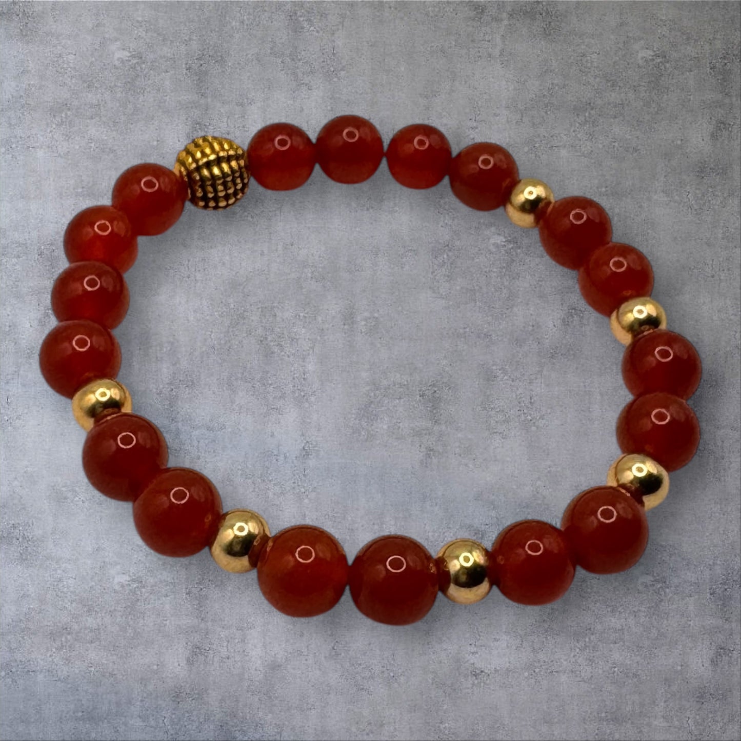 Carnelian (with gold-colored charms) Bracelet