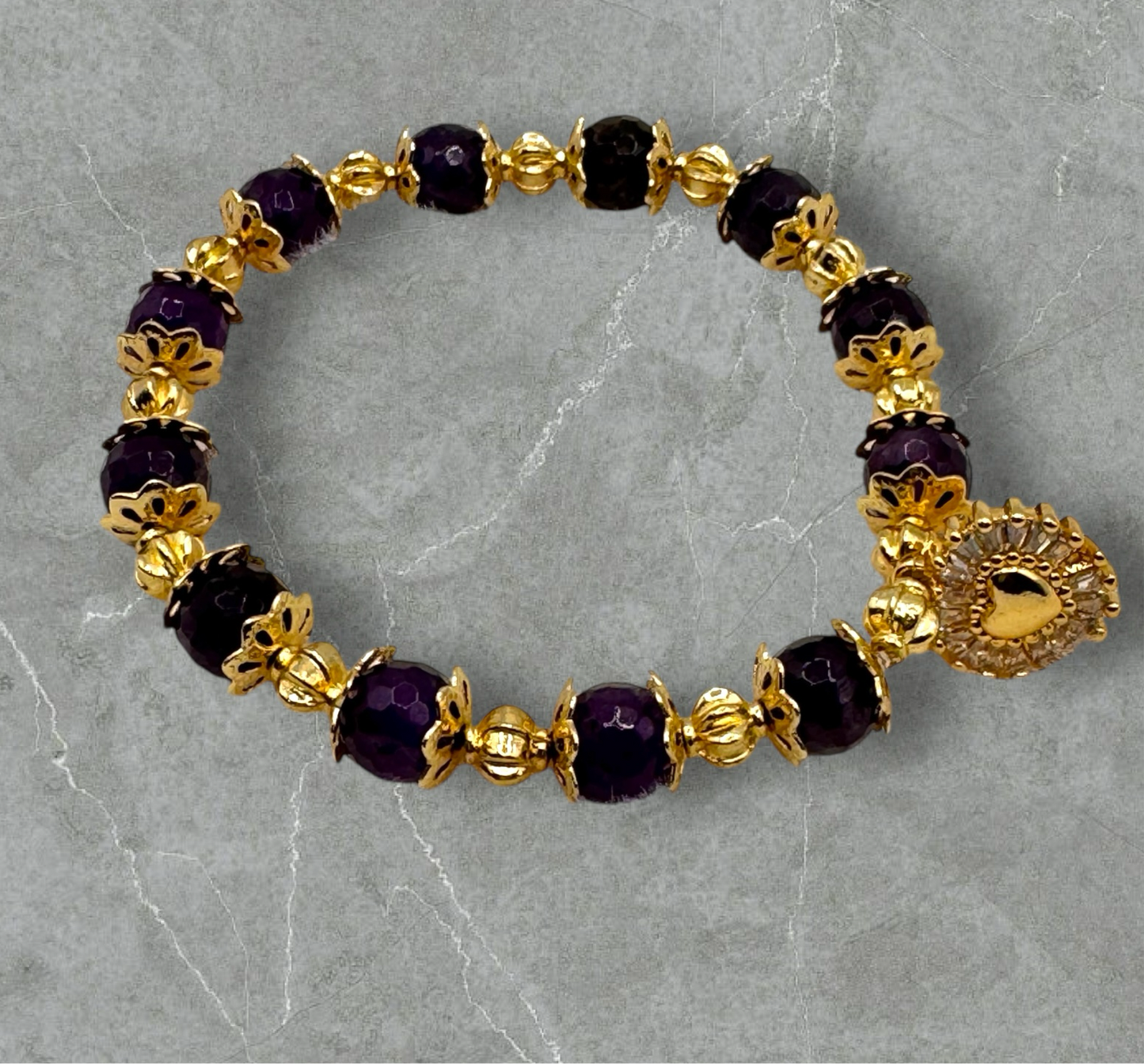 Amethyst & Golden colored Charms Bracelet