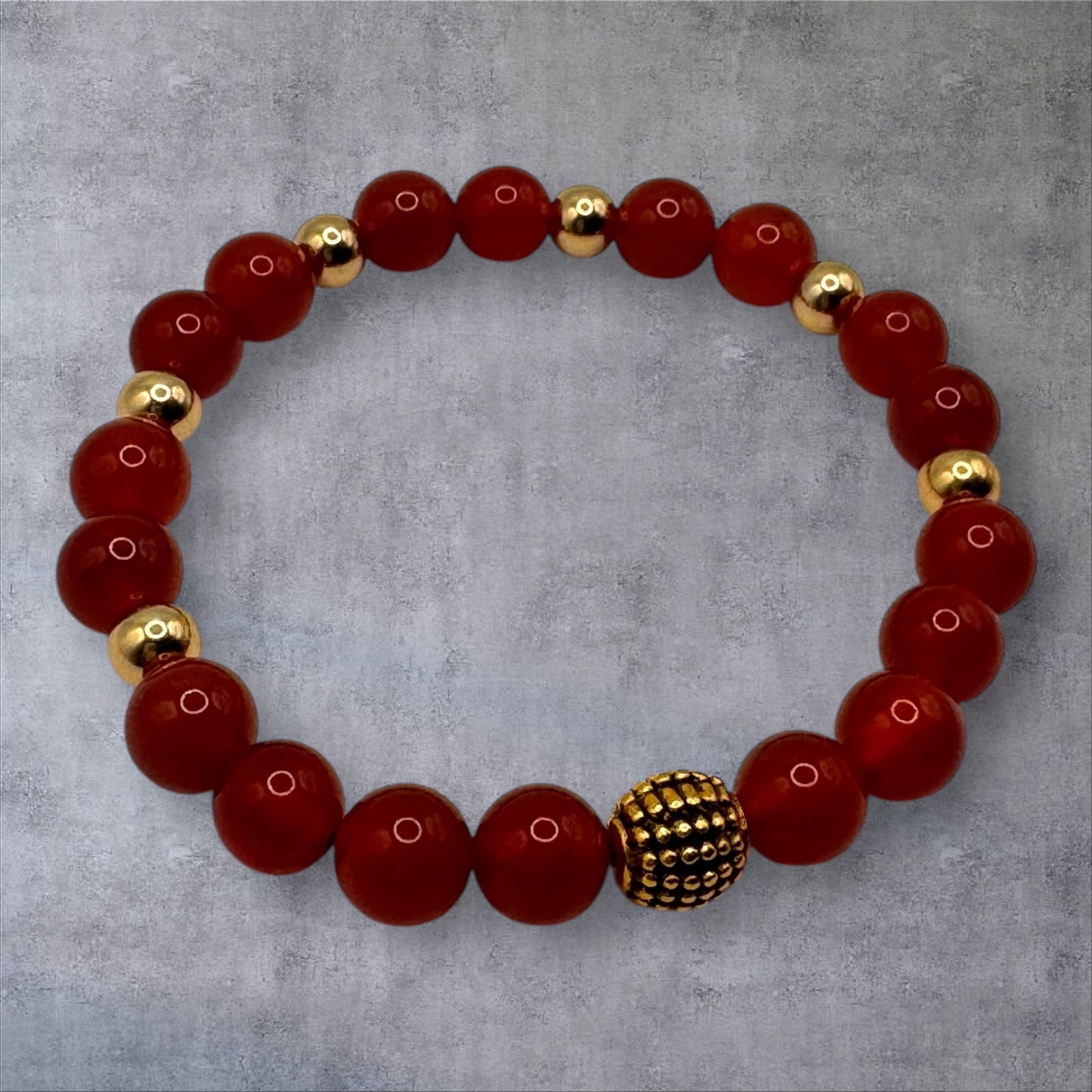 Carnelian (with gold-colored charms) Bracelet